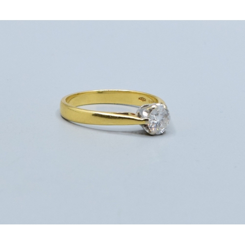 304 - 18ct gold ladies Diamond solitaire ring in a classic design the stone measures 5.5mm across the face... 
