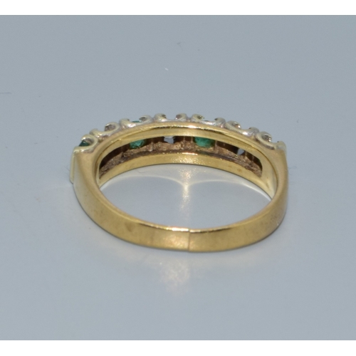 305 - 9ct gold ladies Diamond and Emerald 1/2 eternity ring hallmarked as 0.25ct size L been cut to resize