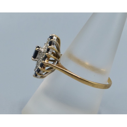 318 - Large ladies Marquise design Sapphire and gem stone statement ring in 9ct gold the head measures 17x... 