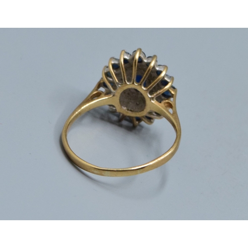 318 - Large ladies Marquise design Sapphire and gem stone statement ring in 9ct gold the head measures 17x... 