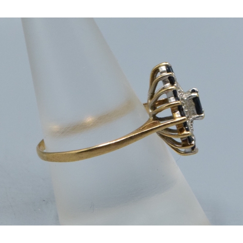 318 - Large ladies Marquise design Sapphire and gem stone statement ring in 9ct gold the head measures 17x... 