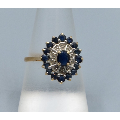 318 - Large ladies Marquise design Sapphire and gem stone statement ring in 9ct gold the head measures 17x... 