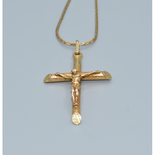 47 - 9ct gold Crucifix and flat link chain of38cm the Crucifix being 45mm drop including the bale by 20mm... 