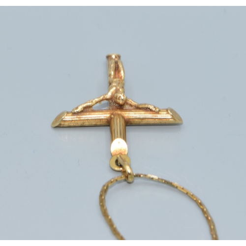 47 - 9ct gold Crucifix and flat link chain of38cm the Crucifix being 45mm drop including the bale by 20mm... 