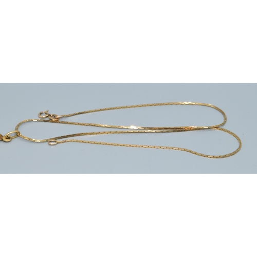47 - 9ct gold Crucifix and flat link chain of38cm the Crucifix being 45mm drop including the bale by 20mm... 