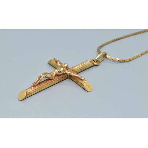 47 - 9ct gold Crucifix and flat link chain of38cm the Crucifix being 45mm drop including the bale by 20mm... 