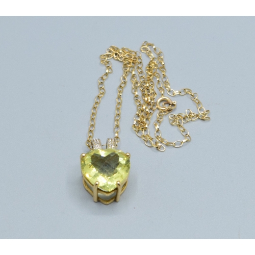 17 - 9ct gold ladies Citrine and Diamond pendant necklace of 2.0cm drop on a 9ct gold chain of 44cm long