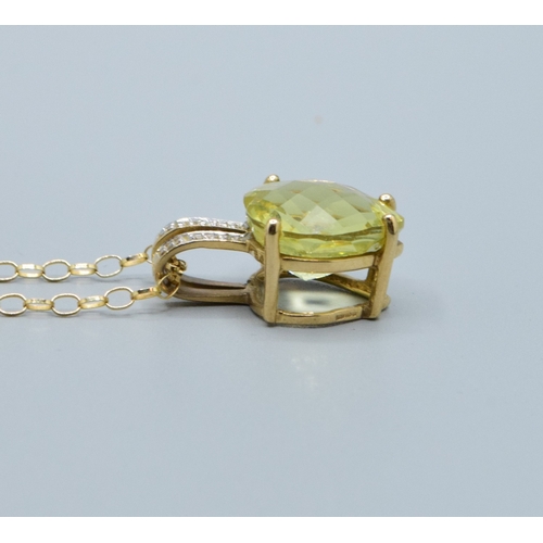 17 - 9ct gold ladies Citrine and Diamond pendant necklace of 2.0cm drop on a 9ct gold chain of 44cm long