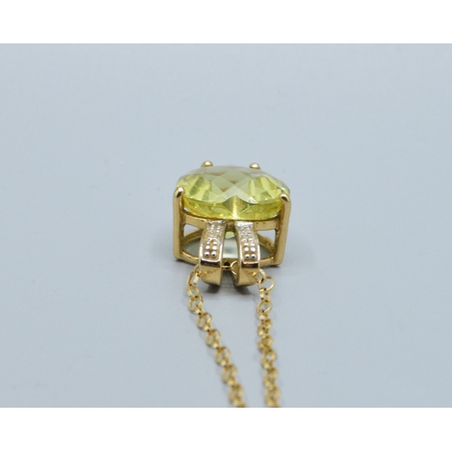 17 - 9ct gold ladies Citrine and Diamond pendant necklace of 2.0cm drop on a 9ct gold chain of 44cm long