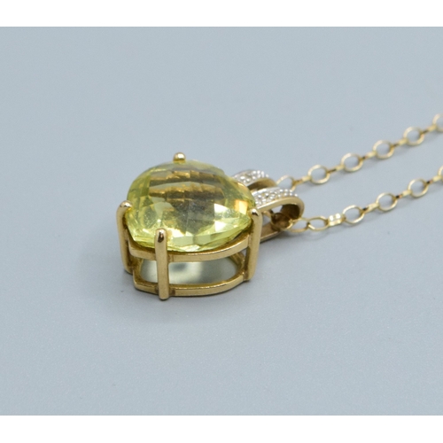 17 - 9ct gold ladies Citrine and Diamond pendant necklace of 2.0cm drop on a 9ct gold chain of 44cm long
