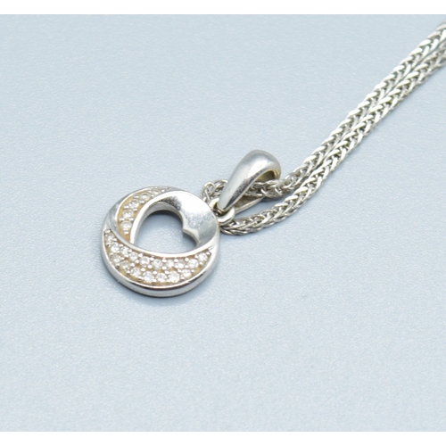 107 - 9ct white gold Diamond pendant necklace on a 9ct white gold chain of 44cm long pendant being 10mm di... 