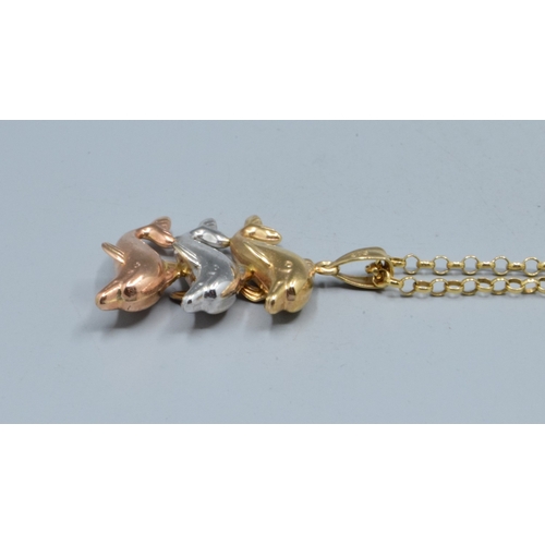 212 - 9ct gold triple colour Dolphin pendant necklace held on a 9ct gold belcher neck chain of 44cm long, ... 