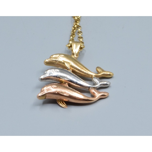212 - 9ct gold triple colour Dolphin pendant necklace held on a 9ct gold belcher neck chain of 44cm long, ... 