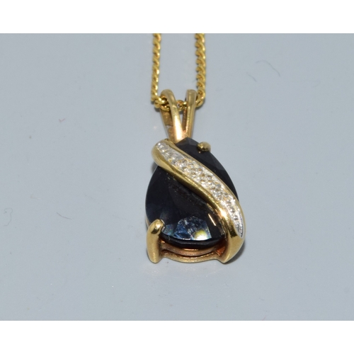 257 - 9ct gold Diamond and Sapphire drop pendant necklace together with a 44cm long 9ct gold chain 3.7gram... 