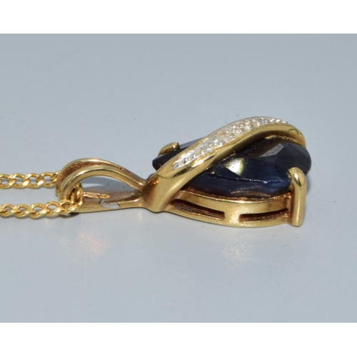 257 - 9ct gold Diamond and Sapphire drop pendant necklace together with a 44cm long 9ct gold chain 3.7gram... 