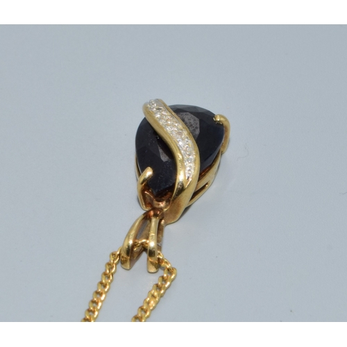 257 - 9ct gold Diamond and Sapphire drop pendant necklace together with a 44cm long 9ct gold chain 3.7gram... 