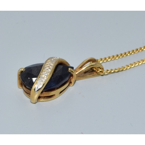 257 - 9ct gold Diamond and Sapphire drop pendant necklace together with a 44cm long 9ct gold chain 3.7gram... 