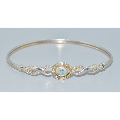 287 - 9ct white gold ladies Aquamarine and accent Diamond bracelet 5.4 grams with a 6cm inner diameter