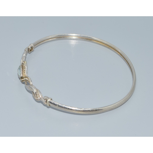 287 - 9ct white gold ladies Aquamarine and accent Diamond bracelet 5.4 grams with a 6cm inner diameter