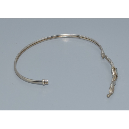 287 - 9ct white gold ladies Aquamarine and accent Diamond bracelet 5.4 grams with a 6cm inner diameter