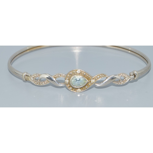 287 - 9ct white gold ladies Aquamarine and accent Diamond bracelet 5.4 grams with a 6cm inner diameter