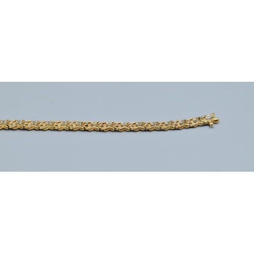 347 - 9ct gold ladies fancy link Diamond line bracelet 18cm long, 4.5mm wide 5.25grams