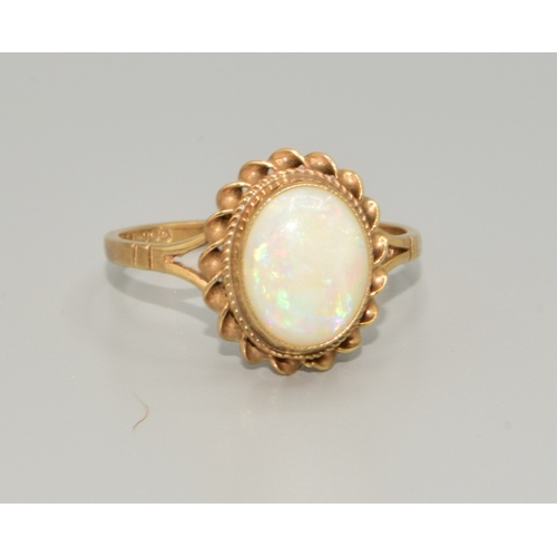 334 - Superb example of 9ct gold vintage suite of Opal jewellery to include a oval Opal ring in 9ct gold s... 