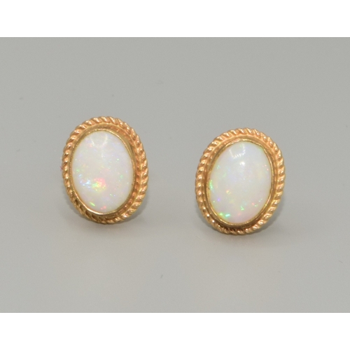 334 - Superb example of 9ct gold vintage suite of Opal jewellery to include a oval Opal ring in 9ct gold s... 