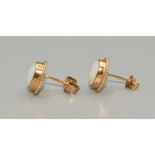 334 - Superb example of 9ct gold vintage suite of Opal jewellery to include a oval Opal ring in 9ct gold s... 