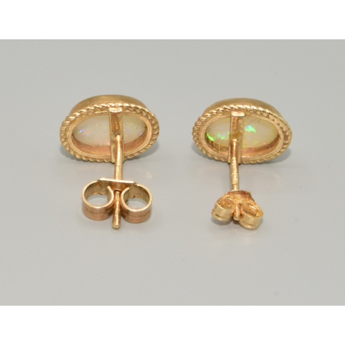 334 - Superb example of 9ct gold vintage suite of Opal jewellery to include a oval Opal ring in 9ct gold s... 