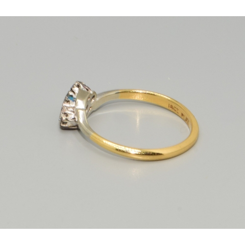 319 - 18ct gold and Platinum ladies 3 stone twist Diamond ring estimated as 0.25cts size M