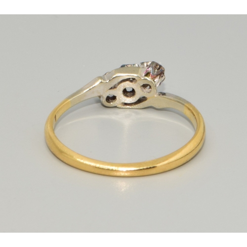 319 - 18ct gold and Platinum ladies 3 stone twist Diamond ring estimated as 0.25cts size M