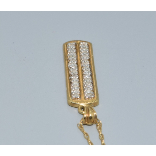 34 - 9ct gold block Diamond pendant necklace on a 44cm long 9ct gold chain 2.4grams