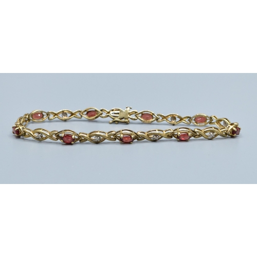 64 - 9ct gold vintage ladies fancy twist link Garnet and Diamond bracelet 18cm long 5mm wide 5.4grams