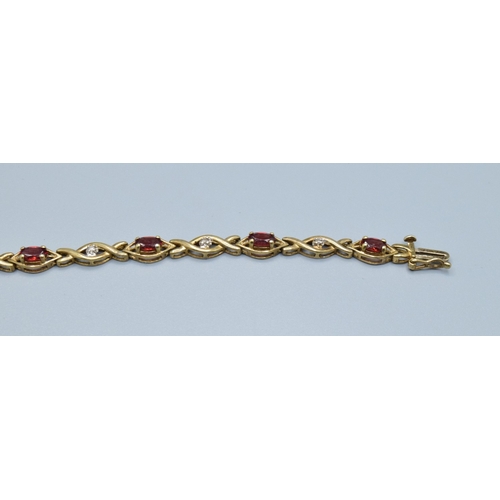 64 - 9ct gold vintage ladies fancy twist link Garnet and Diamond bracelet 18cm long 5mm wide 5.4grams