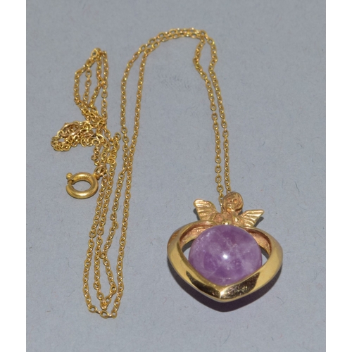 109 - 9ct gold pendant necklace.  Cherub top on a Heart centrally set with an Amethyst sphere.  On a 9ct g... 