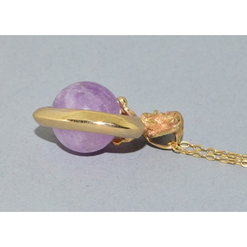 109 - 9ct gold pendant necklace.  Cherub top on a Heart centrally set with an Amethyst sphere.  On a 9ct g... 