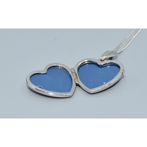 169 - 9ct white gold heart picture locket on a 9ct white gold chain of 44cm long with a plain cartouche a ... 