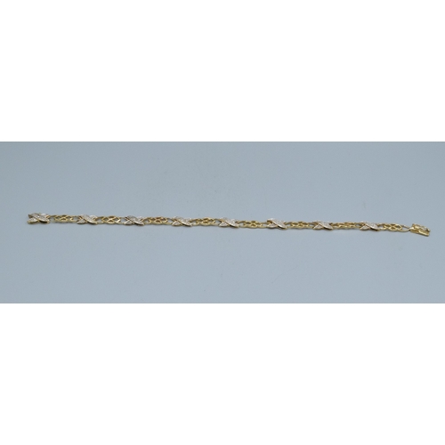 184 - 9ct gold fancy celtic cross over link Diamond decorated ladies bracelet 19cm long 5.5mm wide 6.5gram... 