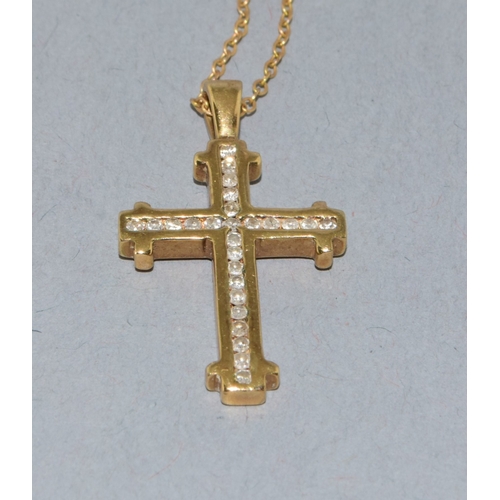259 - 9ct gold Diamond set crucifix pendant necklace the Diamonds in a fix channel setting estimated as 0.... 