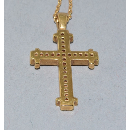 259 - 9ct gold Diamond set crucifix pendant necklace the Diamonds in a fix channel setting estimated as 0.... 