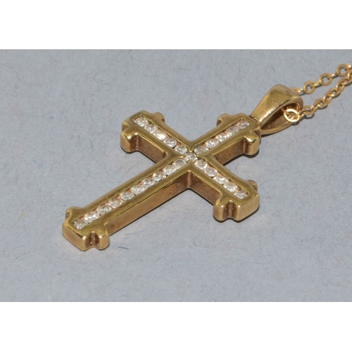 259 - 9ct gold Diamond set crucifix pendant necklace the Diamonds in a fix channel setting estimated as 0.... 