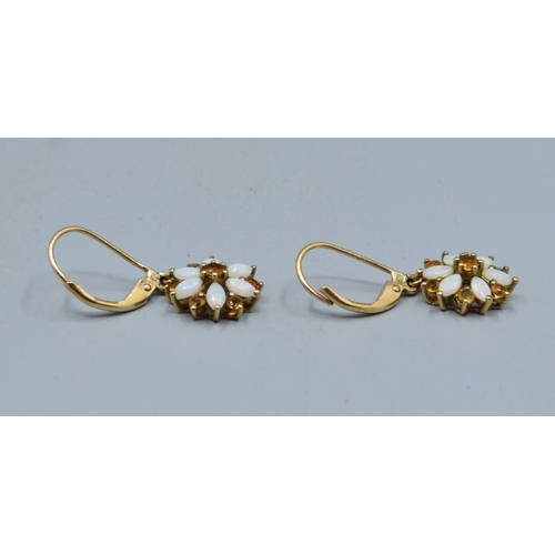 274 - 9ct gold ladies vintage Opal and Citrine star shape clip on earrings held in a claw design the earri... 