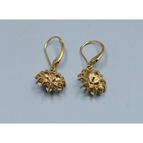 274 - 9ct gold ladies vintage Opal and Citrine star shape clip on earrings held in a claw design the earri... 