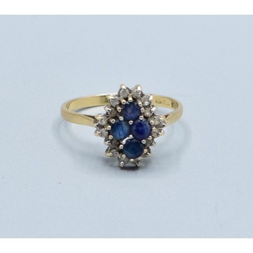 10 - 9ct gold vintage ladies sapphire and Diamond halo dress ring in a claw design size S, 2.6grams