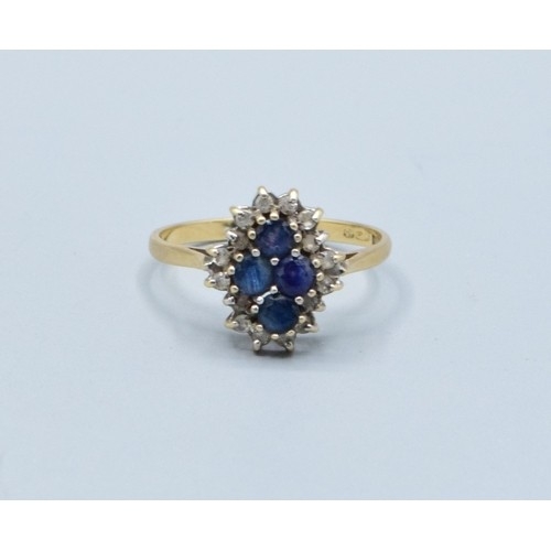 10 - 9ct gold vintage ladies sapphire and Diamond halo dress ring in a claw design size S, 2.6grams