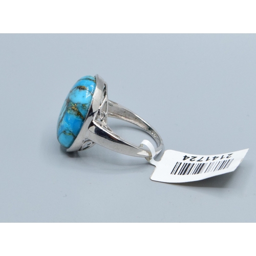 192 - New with tag ladies oval cabochon Turquoise dress ring the head being 22x17mm size Q