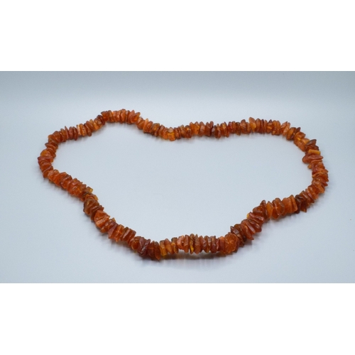 157 - Large unpolished Baltic Amber chip necklace 74grams