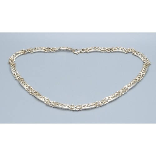 148 - 925 silver very unusual design neck chain with a flat box  and scroll design with lobster claw catch... 