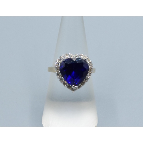 44 - 925 silver ladies Heart shape Sapphire halo design ring in a claw setting size P